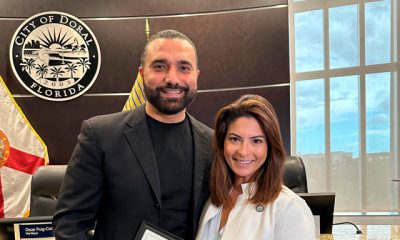 Carlos Mesber y Christi Fraga durante el evento en Doral.